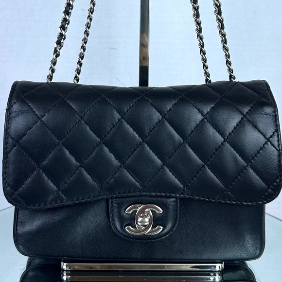 CHANEL Handbags - CHANEL MINI FLAP BAG BLACK SHW